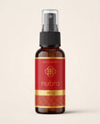 Nubra parfum 50 ml, etichetă roșie, flacon chihlimbariu pe fundal crem
